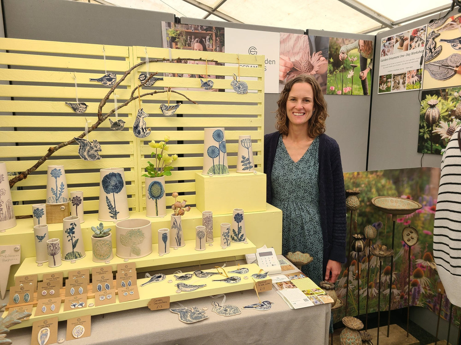 Emma standing in her display stand at RHS Hyde Hall